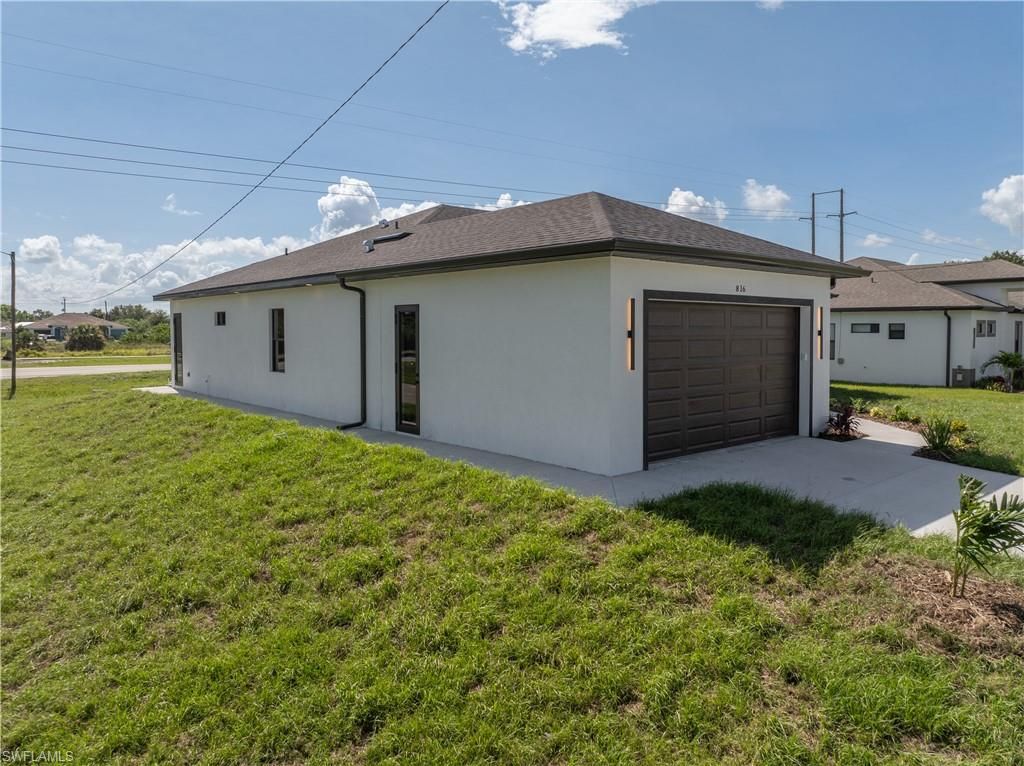 816 Floyd AVE S, LEHIGH ACRES, FL 33976 — photo 4