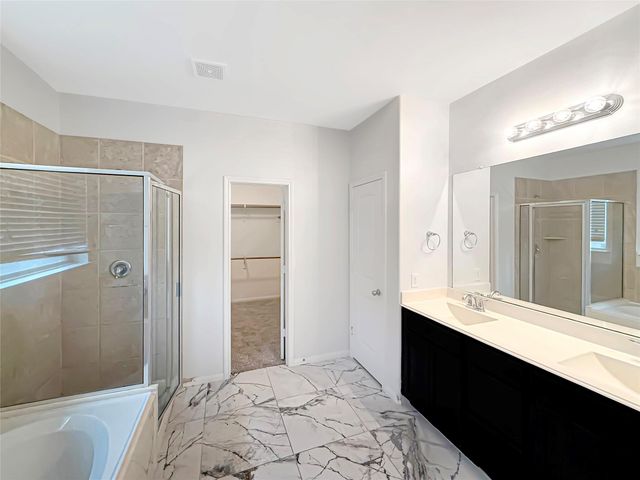 4 Logan Creek Lane, Conroe, TX 77304