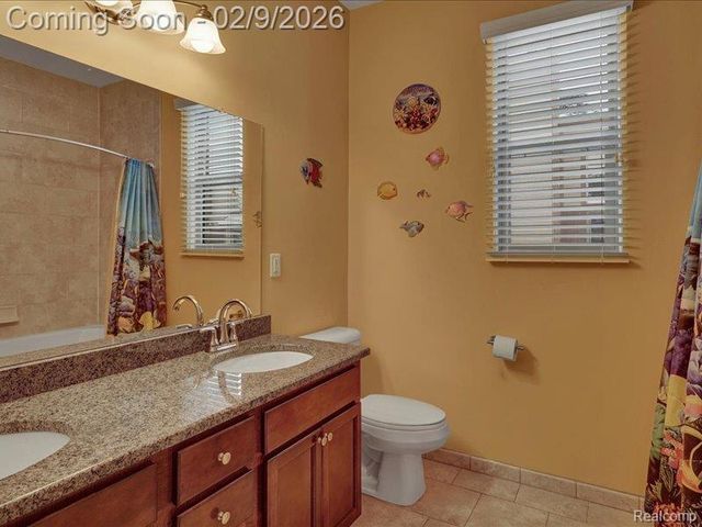 19201 N Grisham Drive E, Macomb Township, MI 48044