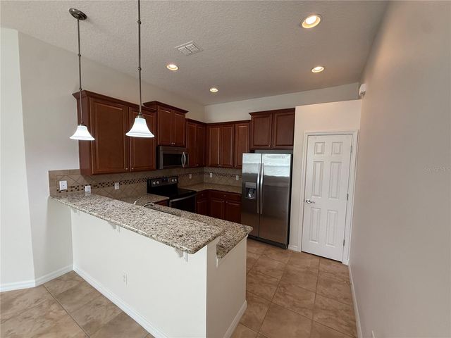 12108 TRIPLETAIL LANE, Orlando, FL 32827