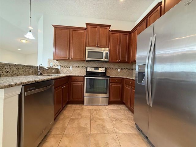 12108 TRIPLETAIL LANE, Orlando, FL 32827