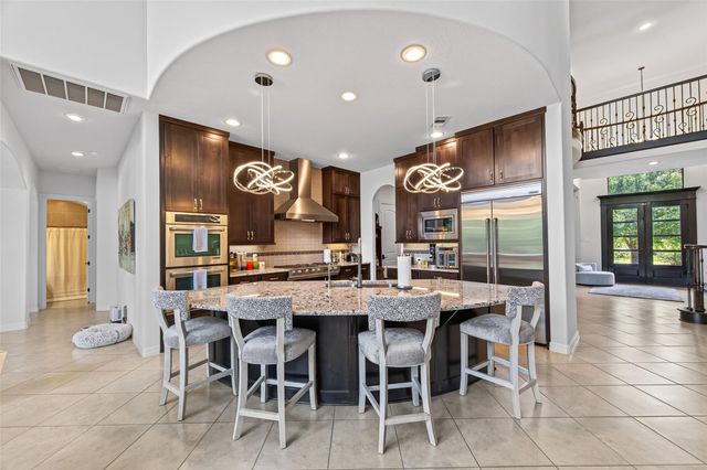 6 Yarbrough Bend Court, Spring, TX 77389