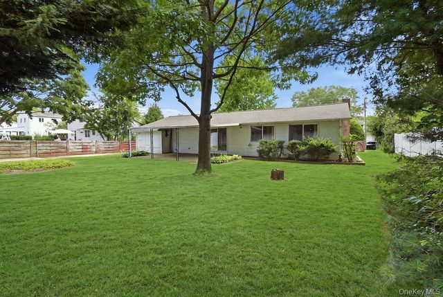 6 Budenos Drive, Sayville, NY 11782