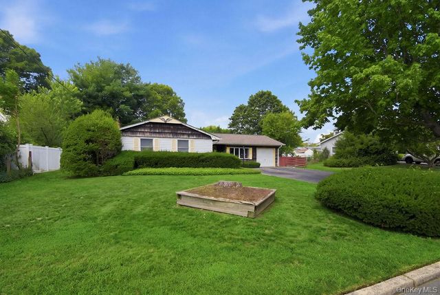 6 Budenos Drive, Sayville, NY 11782