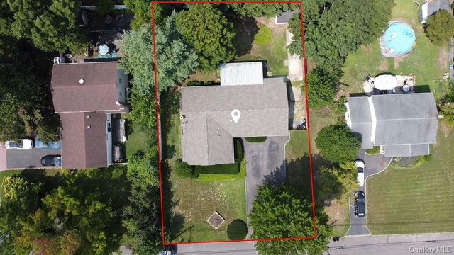 6 Budenos Drive, Sayville, NY 11782
