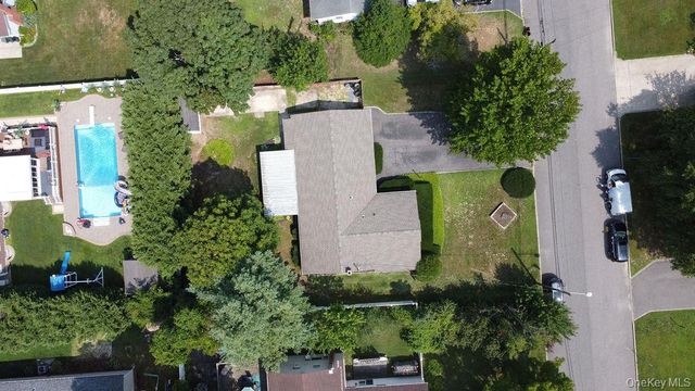 6 Budenos Drive, Sayville, NY 11782