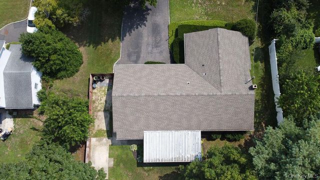 6 Budenos Drive, Sayville, NY 11782