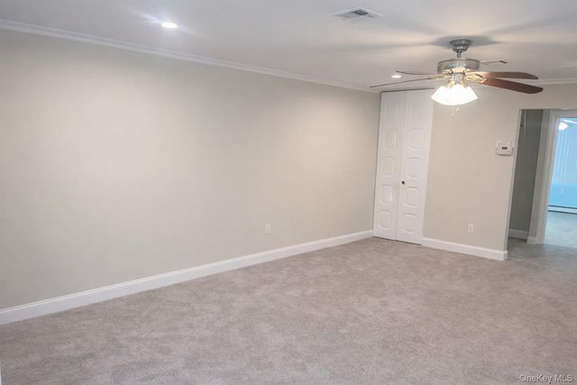 395 Woodbridge Drive C, Ridge, NY 11961