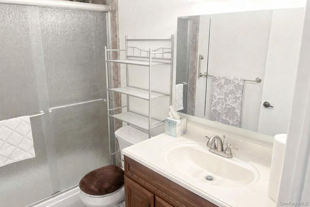 395 Woodbridge Drive C, Ridge, NY 11961