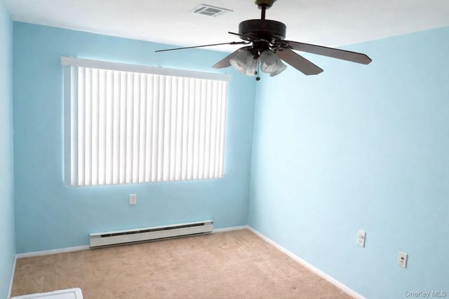 395 Woodbridge Drive C, Ridge, NY 11961