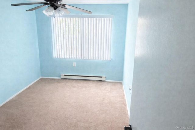 395 Woodbridge Drive C, Ridge, NY 11961