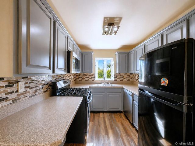 93-03 91 Avenue, Woodhaven, NY 11421