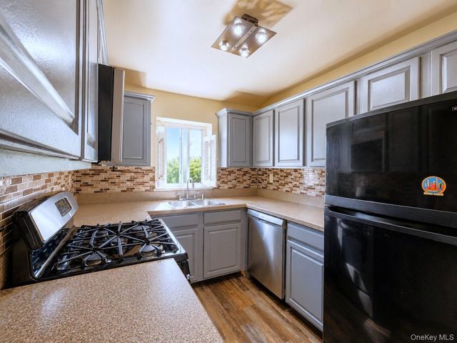 93-03 91 Avenue, Woodhaven, NY 11421