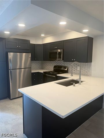 1100 Pondella RD 703, Cape Coral, FL 33909