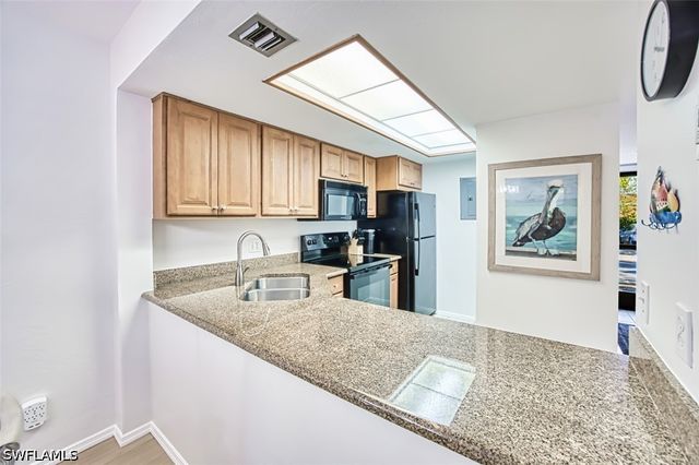 600 Neapolitan WAY 153, Naples, FL 34103