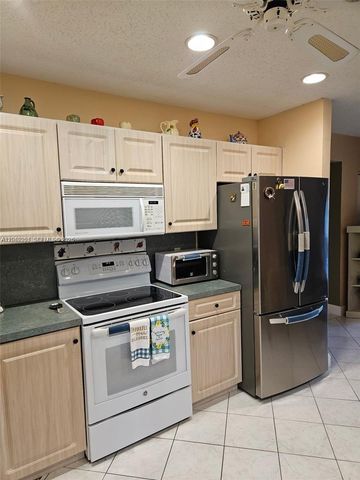 10301 Greenbriar Court, Boca Raton, FL 33498