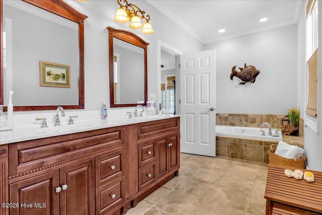 711 Alyssum Avenue, Oak Island, NC 28465