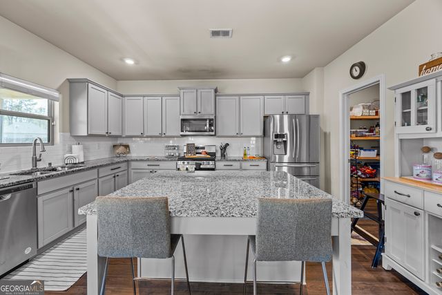 489 Azalea Bloom Drive, Loganville, GA 30052