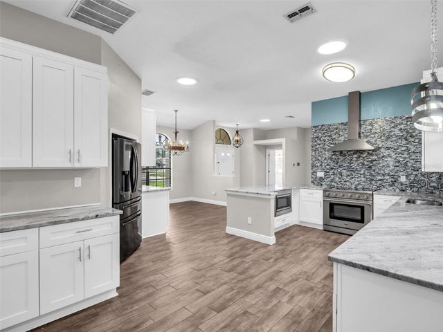 447 WHISPERING LAKES BOULEVARD, Tarpon Springs, FL 34688