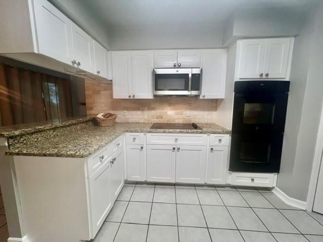 27 N Greenbud Court, The Woodlands, TX 77380
