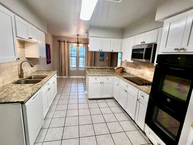 27 N Greenbud Court, The Woodlands, TX 77380