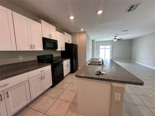 7157 SAMUEL IVY DRIVE, Tampa, FL 33619