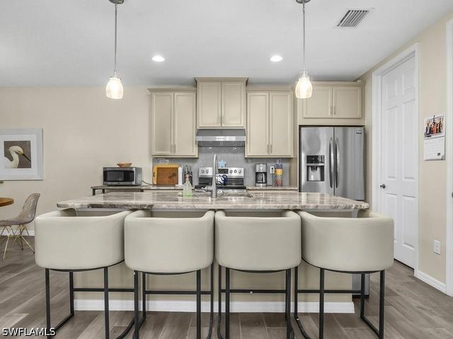 14867 Edgewater CIR, Naples, FL 34114
