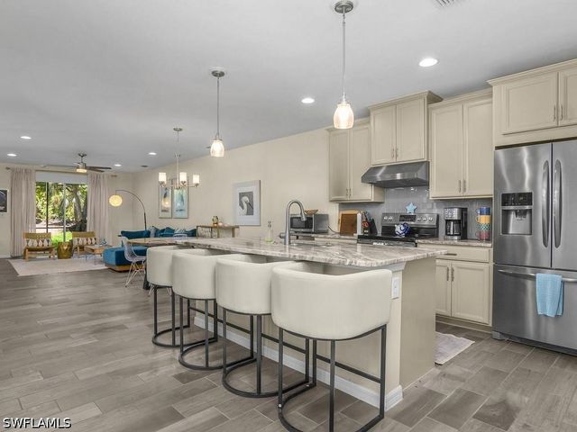 14867 Edgewater CIR, Naples, FL 34114