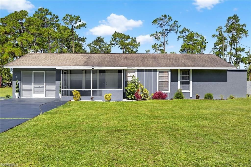 713 Canton AVE, LEHIGH ACRES, FL 33972 — exterior
