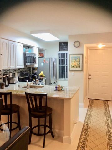 2220 N Cypress Bend Drive 104, Pompano Beach, FL 33069