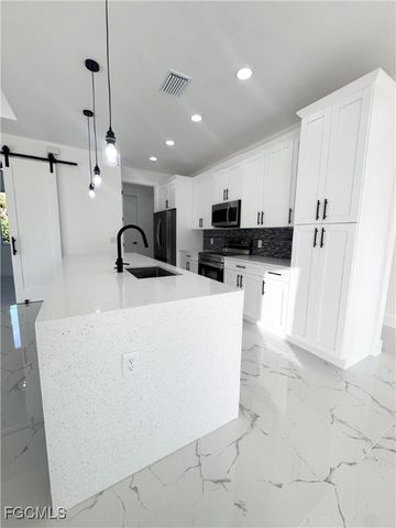 615 Clayton AVE, Lehigh Acres, FL 33972