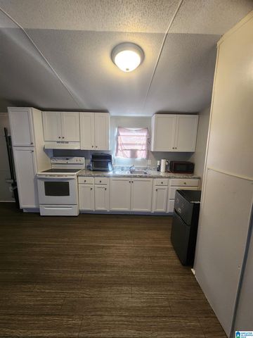 1306 RUSSELL DRIVE, Weaver, AL 36277