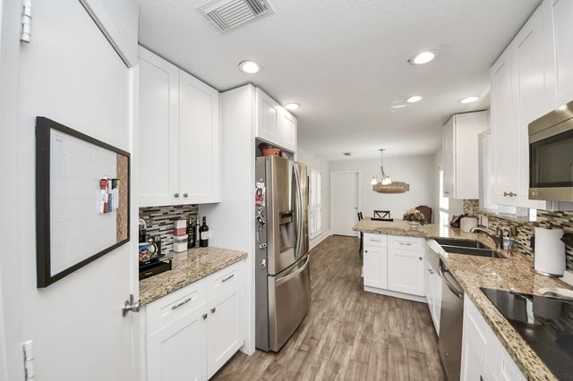 3122 Holly Green Drive, Kingwood, TX 77339