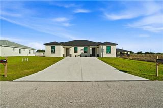 2404/2406 Mae AVE S, Lehigh Acres, FL 33973