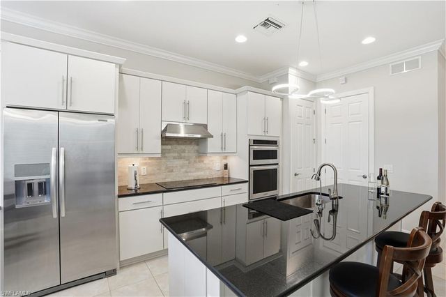 9328 Fieldstone LN, Naples, FL 34120