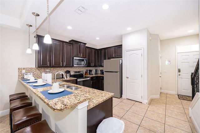 8213 ROSEVILLE BOULEVARD, Davenport, FL 33896