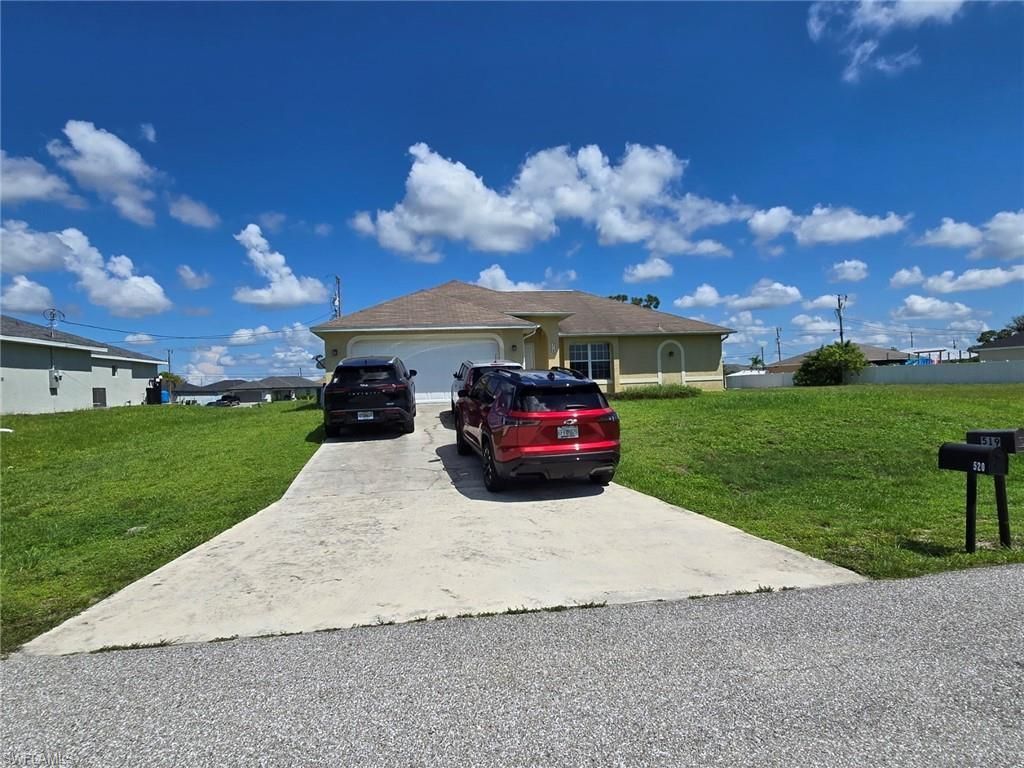 519 NW 26th ST, CAPE CORAL, FL 33993 — photo 2