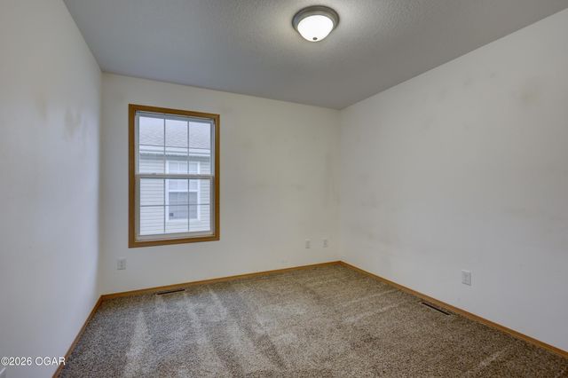 609 S Arch Street, Carterville, MO 64835