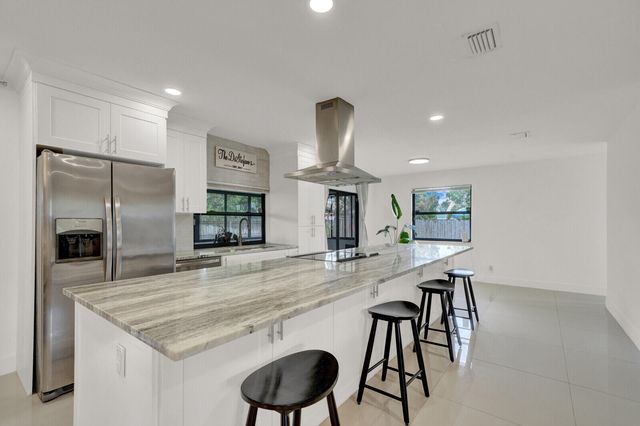 107 Segovia Avenue, Royal Palm Beach, FL 33411