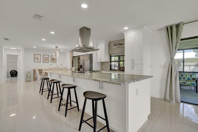 107 Segovia Avenue, Royal Palm Beach, FL 33411