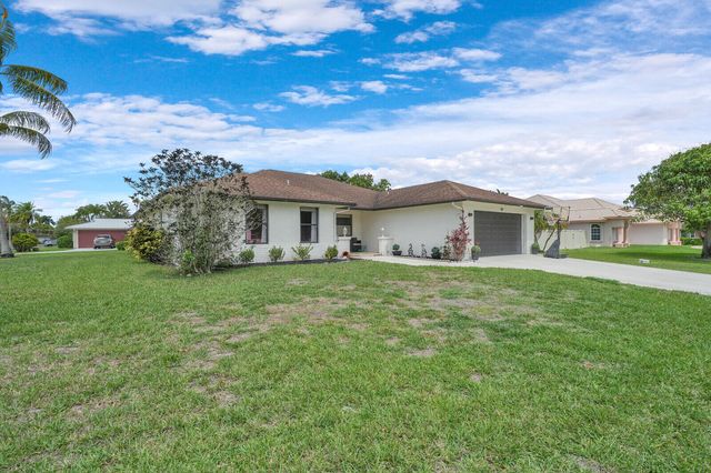107 Segovia Avenue, Royal Palm Beach, FL 33411