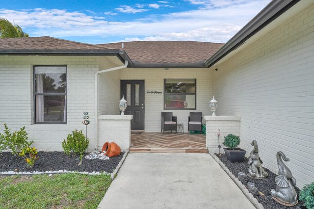 107 Segovia Avenue, Royal Palm Beach, FL 33411