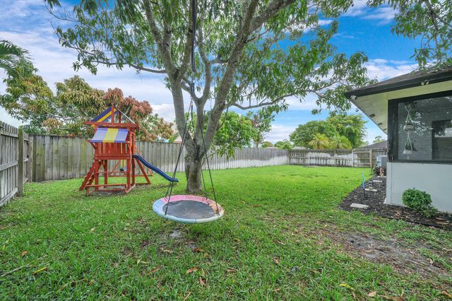 107 Segovia Avenue, Royal Palm Beach, FL 33411