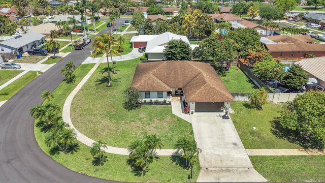 107 Segovia Avenue, Royal Palm Beach, FL 33411