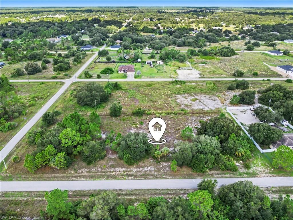 1705 JOHNS AVE, LEHIGH ACRES, FL 33972 — exterior