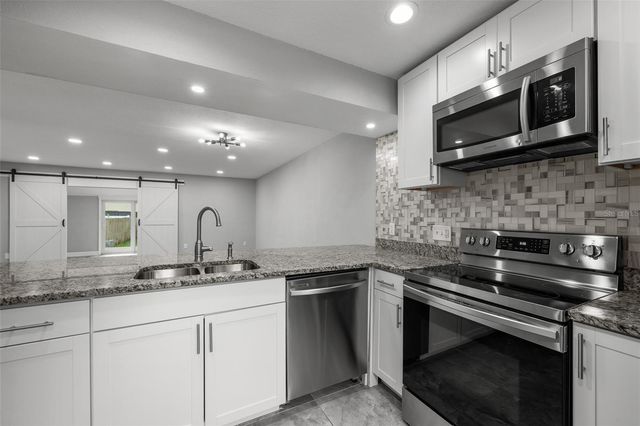 210 S MALCOLM COURT, Tampa, FL 33609