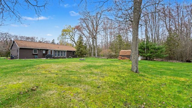 7682 Woodlea Road, Oscoda, MI 48750