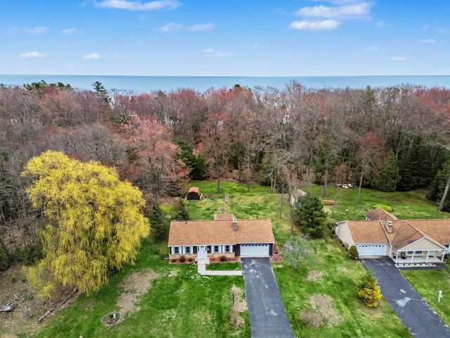 7682 Woodlea Road, Oscoda, MI 48750