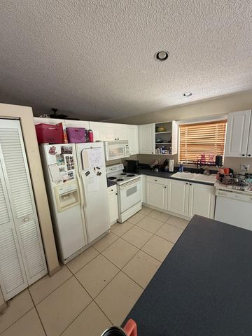 8164 PELICAN HARBOUR Drive, Lake Worth, FL 33467