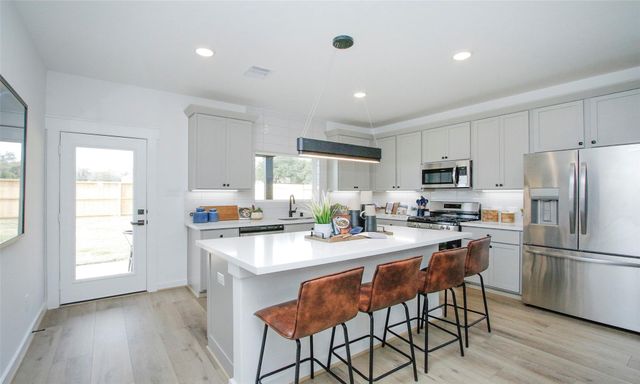 4028 Colony River Rock Boulevard, Pinehurst, TX 77362